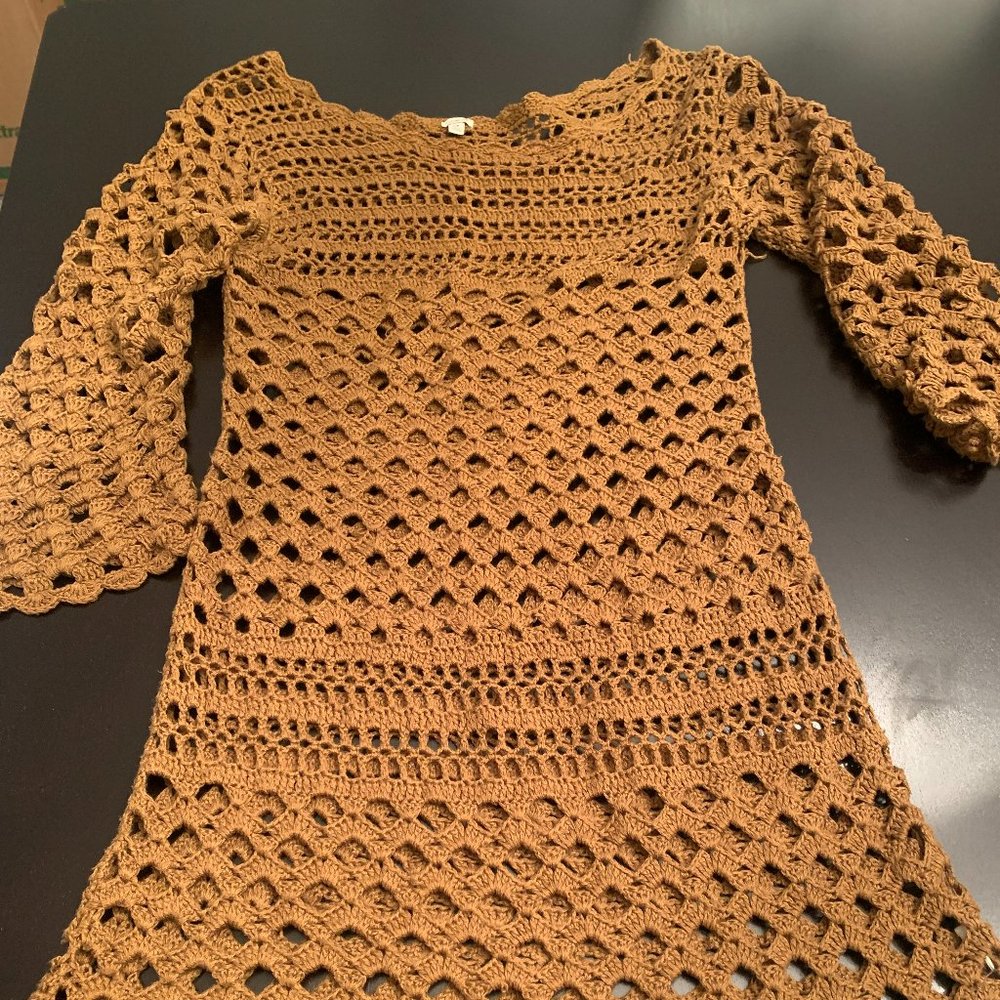 Female brown sweater